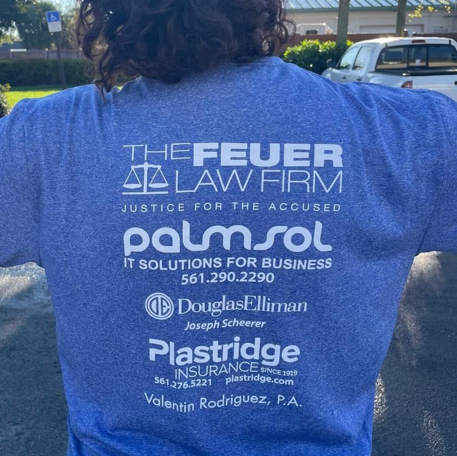 Community sponsorship shirt featuring PalmSol alongside local businesses